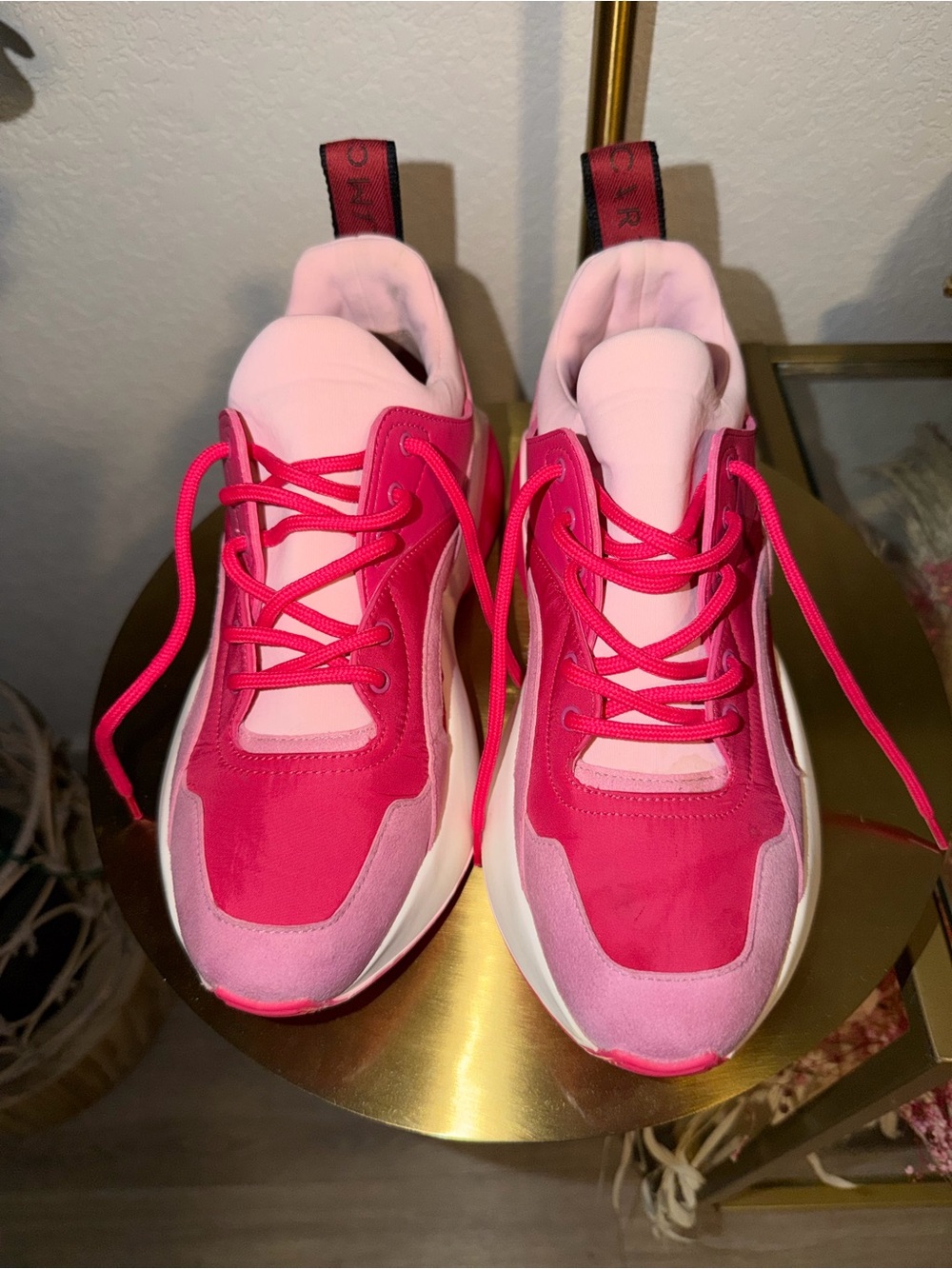 Stella McCartney Eclypse sneakers in a pink and fuchsia colorway.